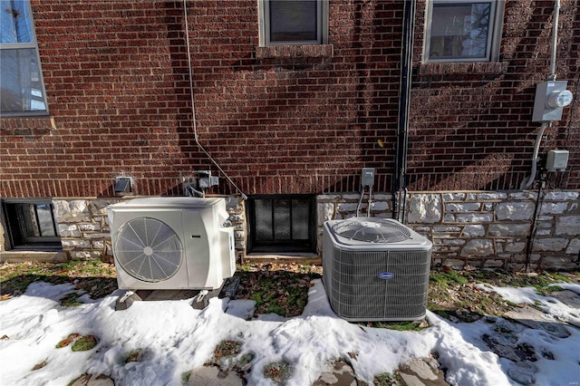 exterior details with cooling unit and ac unit