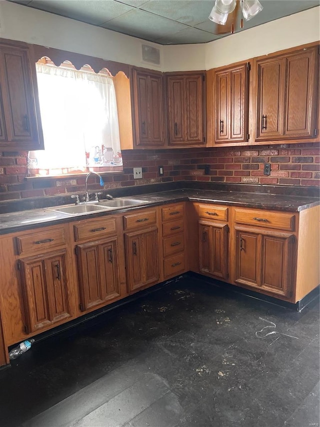 kitchen with decorative backsplash and sink