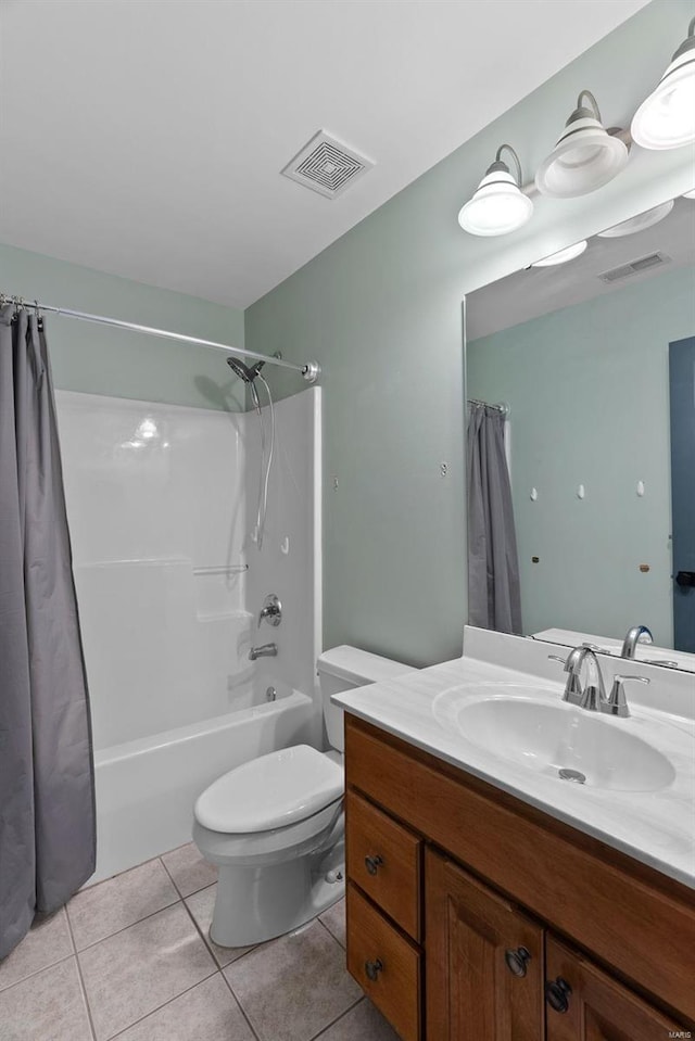 full bathroom with tile patterned flooring, shower / bath combination with curtain, vanity, and visible vents