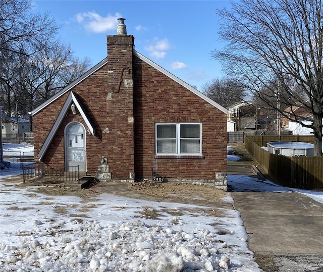 view of snow covered property