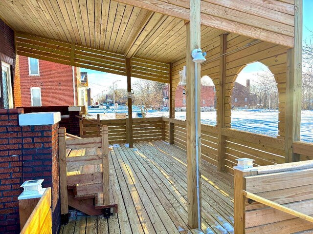 view of snow covered deck