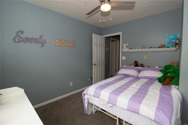 bedroom with carpet floors, a textured ceiling, and ceiling fan