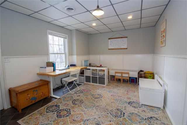 office space with dark tile patterned floors