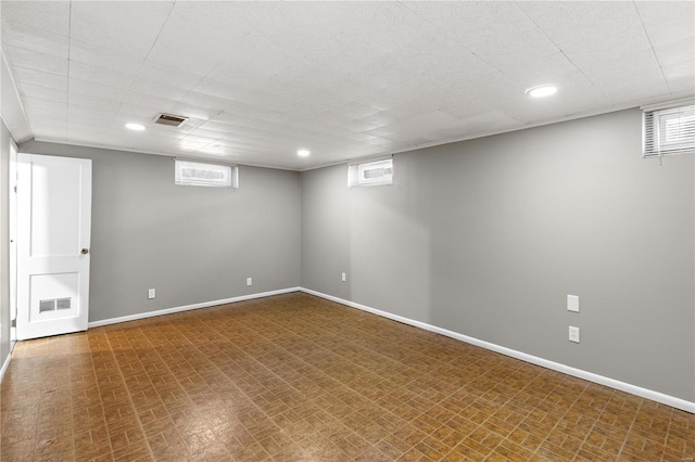 basement featuring plenty of natural light