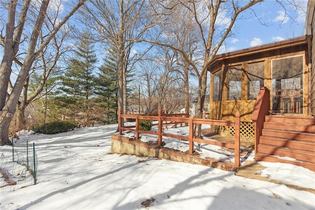 view of snow covered deck