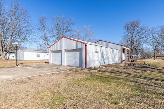 garage with a yard