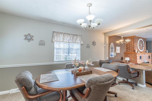 carpeted dining space with a notable chandelier