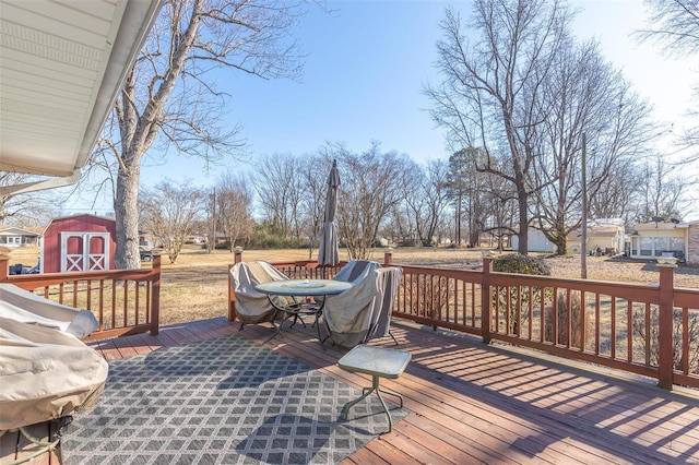 deck featuring a storage shed