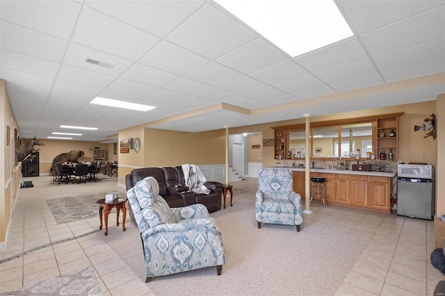 living room with light tile patterned floors