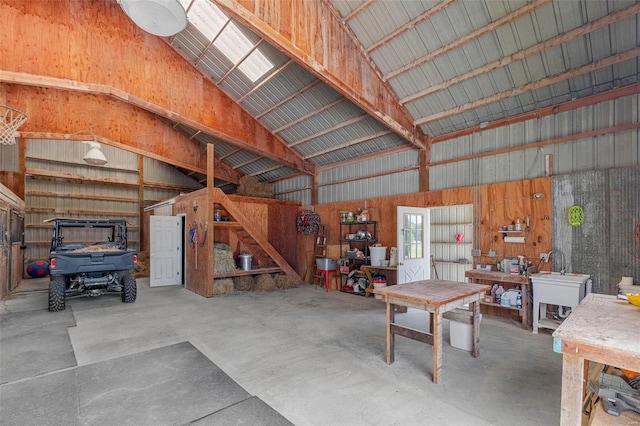 garage with sink and wood walls