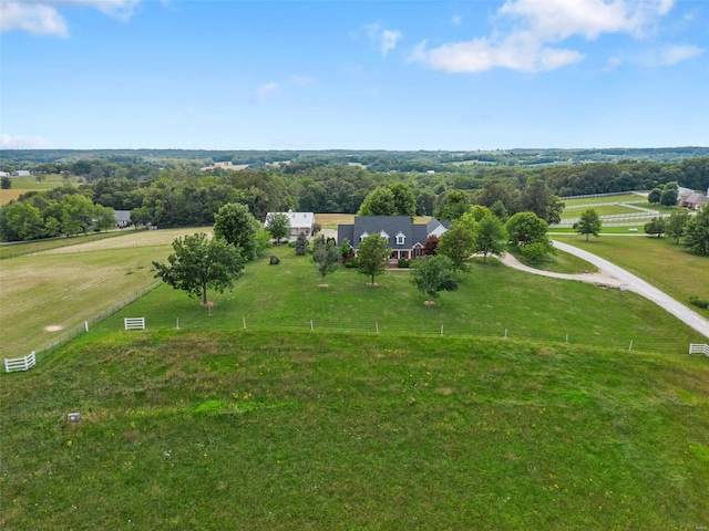 birds eye view of property with a rural view