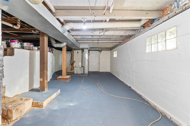 basement featuring heating unit