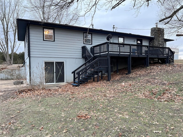 rear view of property with a deck