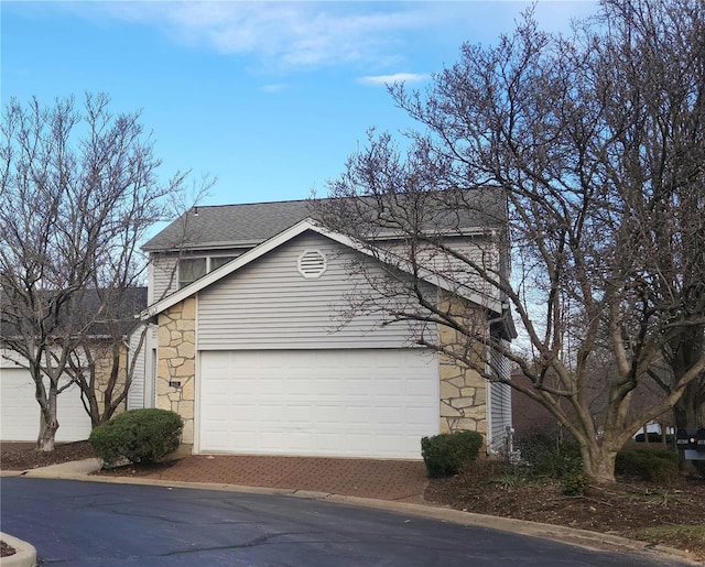 exterior space with a garage