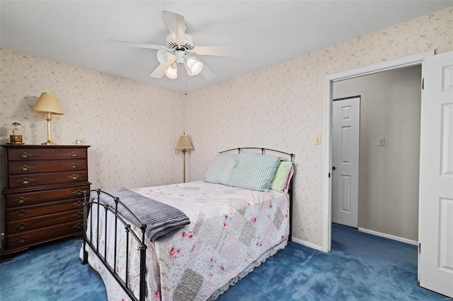 bedroom featuring dark colored carpet and ceiling fan