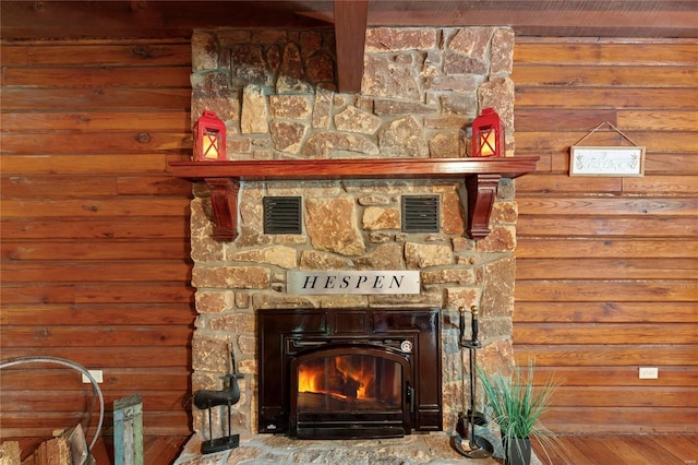 room details featuring a stone fireplace