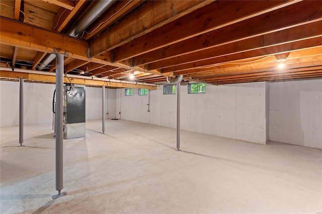 basement featuring heating unit