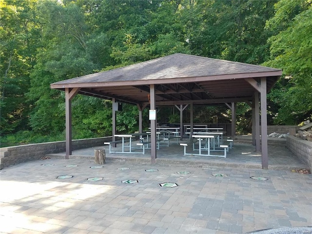 view of property's community with a gazebo and a patio area