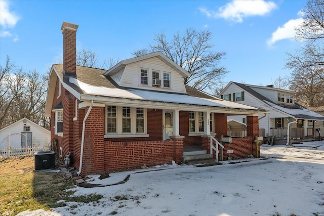 bungalow-style house with central AC