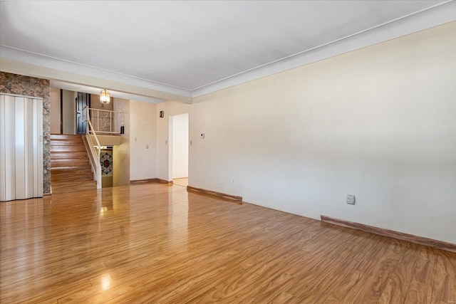 empty room with light hardwood / wood-style floors