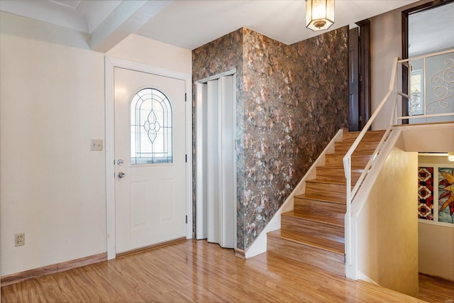 foyer with hardwood / wood-style floors