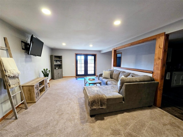 living room with french doors and light colored carpet