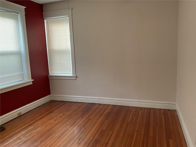 empty room featuring hardwood / wood-style floors