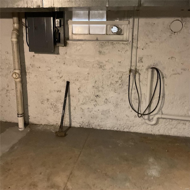 basement featuring electric panel