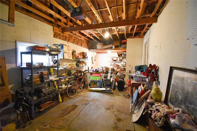 interior space with a workshop area and a garage door opener