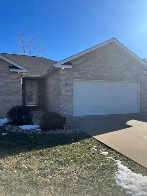 view of property exterior featuring a garage