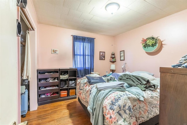 bedroom featuring hardwood / wood-style floors