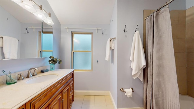 bathroom featuring tile patterned floors and vanity