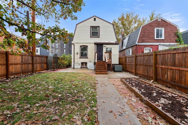 back of property featuring central AC and a patio area