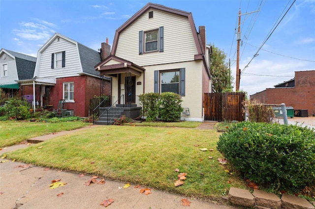 view of front property featuring a front lawn