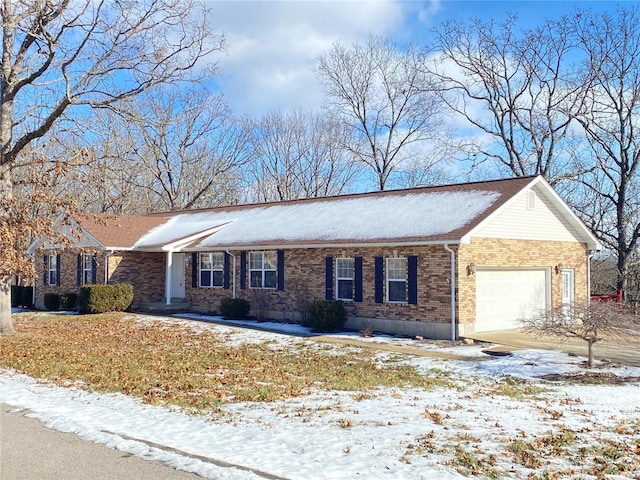 ranch-style home featuring a garage