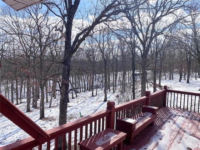 view of snow covered deck