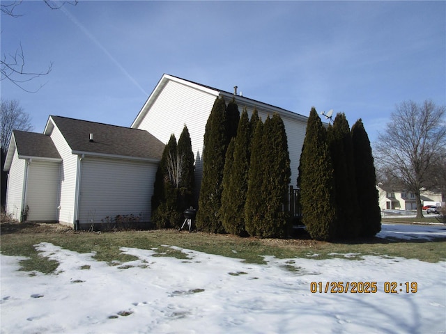 view of snow covered property