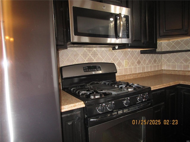 kitchen featuring backsplash and stainless steel appliances