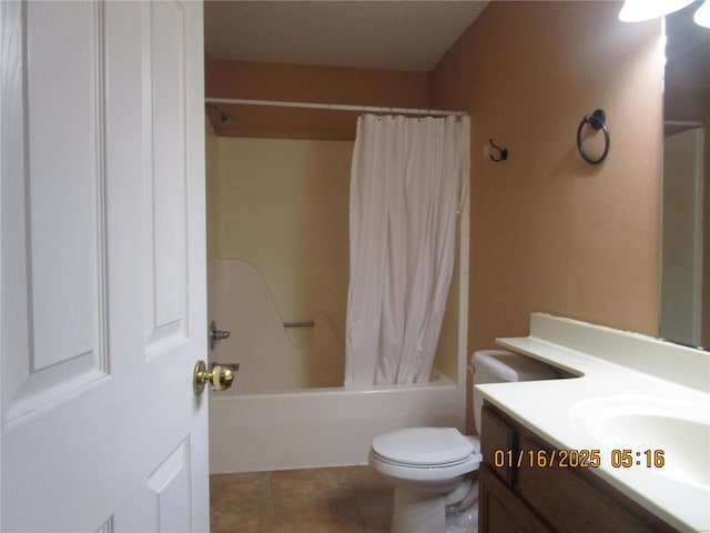 full bathroom featuring tile patterned flooring, vanity, toilet, and shower / bath combo with shower curtain