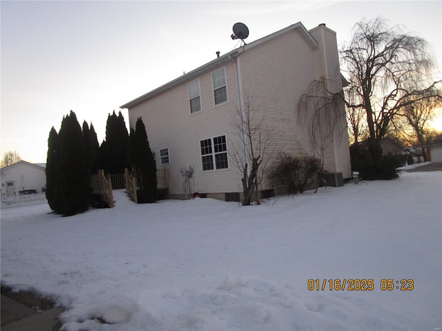 view of snow covered property