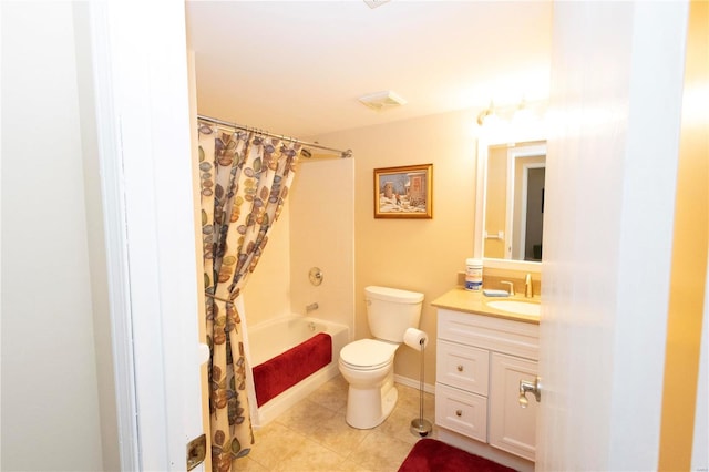 full bathroom featuring toilet, vanity, and shower / tub combo