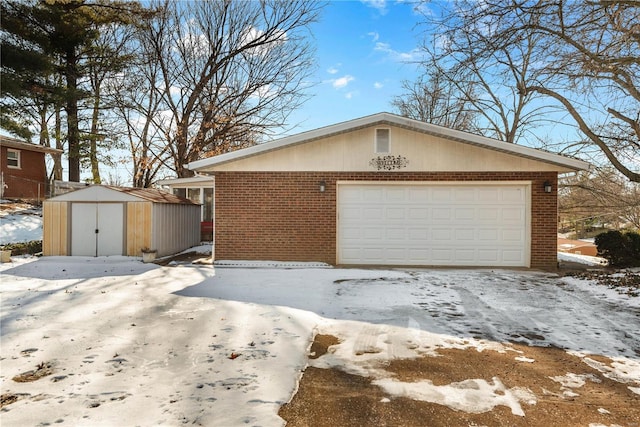 view of snow covered garage