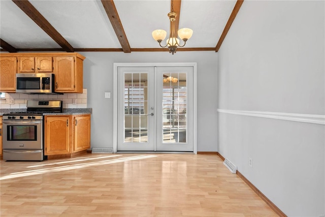 kitchen with backsplash, stainless steel appliances, decorative light fixtures, french doors, and beamed ceiling