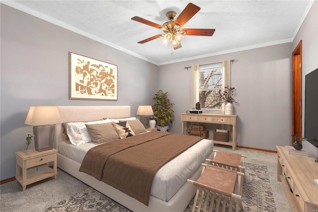 bedroom featuring crown molding, ceiling fan, light colored carpet, and a textured ceiling