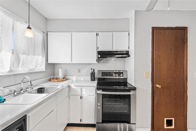 kitchen featuring hanging light fixtures, sink, white cabinetry, stainless steel range with electric stovetop, and black dishwasher