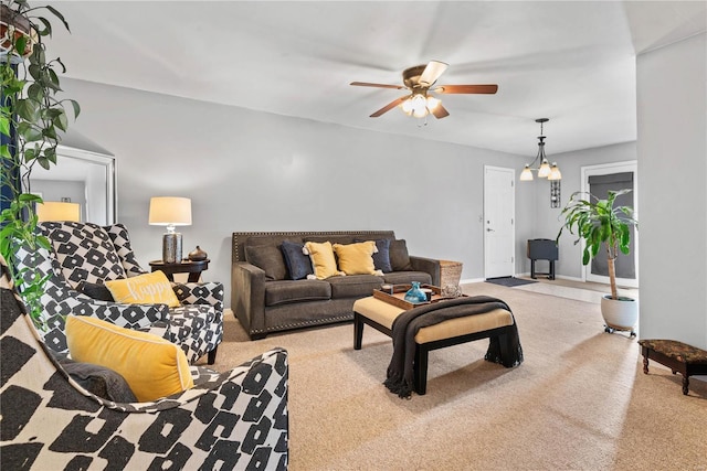 carpeted living room featuring ceiling fan