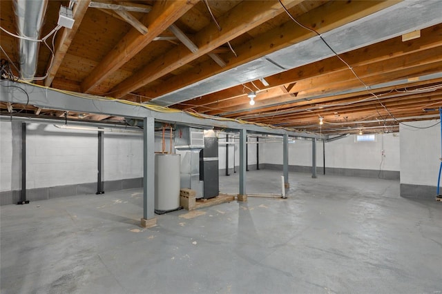 basement featuring heating unit and gas water heater