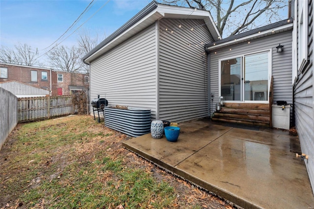 back of property featuring a patio