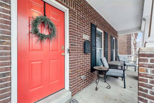 entrance to property with a porch