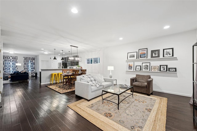 living room with dark wood-type flooring